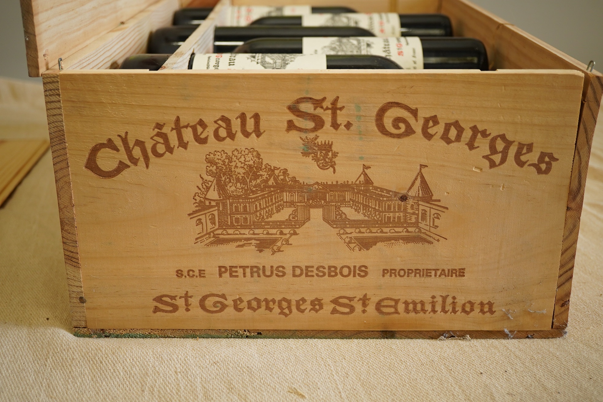 Twelve bottles of 2004 Chateau St. Georges St. Emilion (O.W.C but opened).